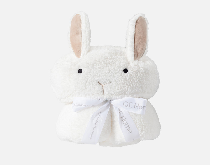 Front view of our Rabbit Hooded Animal Throw bundled up with a tidy bow.