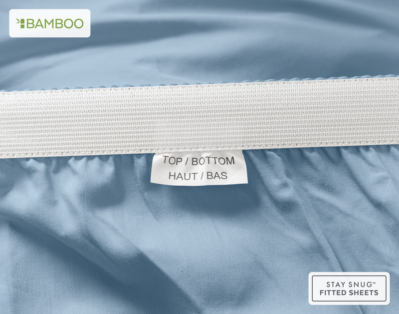 Bottom elastic on our Bamboo Cotton Fitted Sheet in Mistral Blue to show a tag stating "Top" and "Bottom".