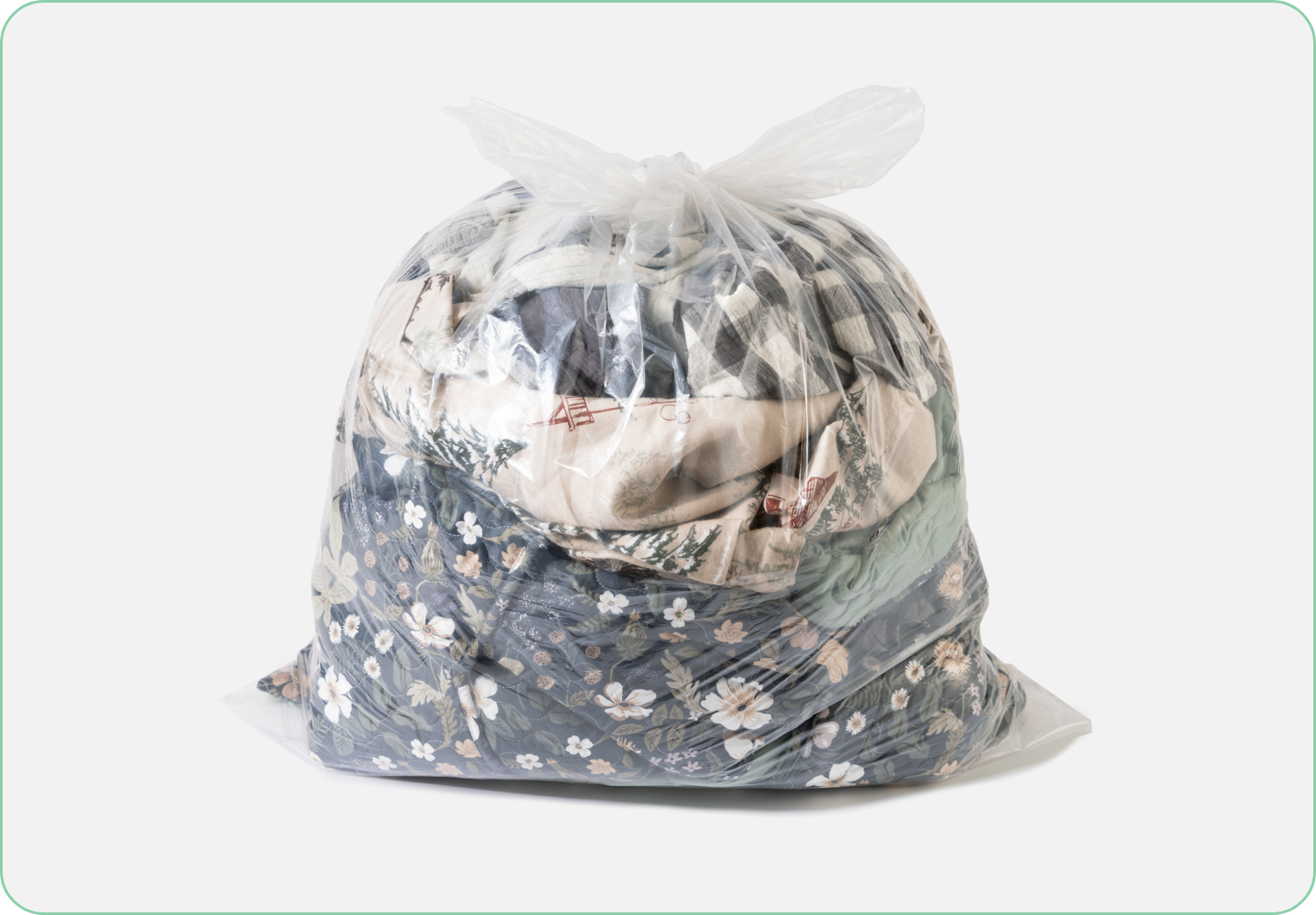 Bedding sitting in a sealed plastic bag.