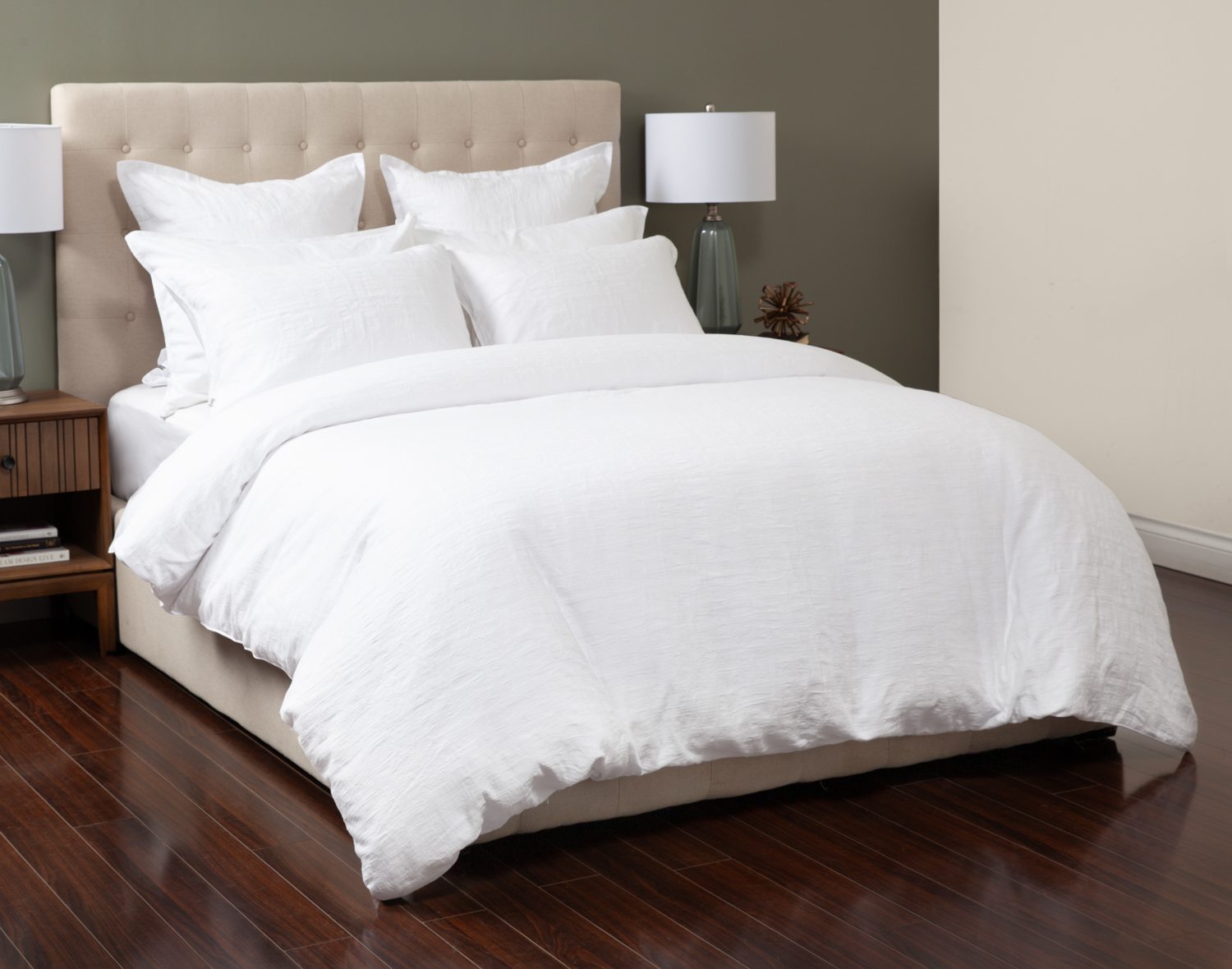 Angled view of our Chalkstone collection dressing a queen bed in a simple room.