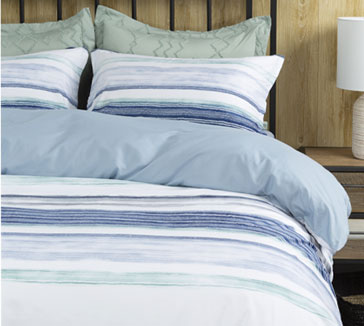 Green, blue, and white bedding.