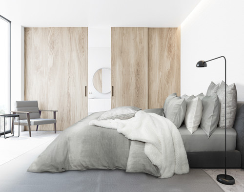 Benito Duvet Cover dressed over a queen bed in a contemporary bedroom.