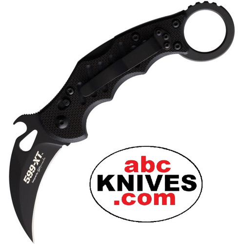 Hero – Fox 599 XT Black Böhler N690 Black G10 Folding Karambit open with the black blade and textured black G10 handle with finger ring