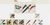 Main homepage of TrainingKnives.com showing training knife catalog layout with product grid, navigation menu, and training-focused branding displayed on screen