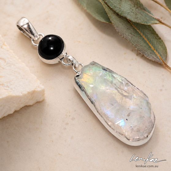 Emerging Light | Black Onyx & Titanium Aura Quartz Pendant