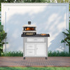 Fenix Artisan Pizza Oven Cart  With Cream Gozney Dome Oven Shown In Light Gray Steel And Black Granite Countertop