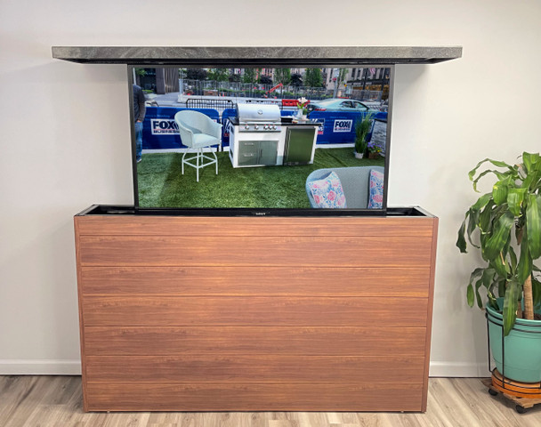 Outdoor TV Lift Cabinet, Lift Open, Straight View. Light National Walnut With Black Polished Granite Top