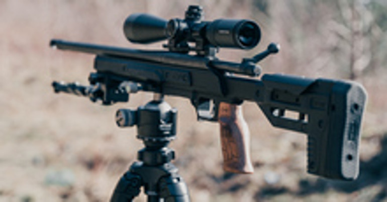 Remington 700 AAC-SD in ORYX rifle chassis with black side panels.