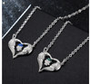Winged heart skull necklace