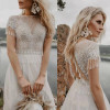 Bohemia Tassel Boho Wedding Dress Lace Backless Short Sleeve Tulle Beach Wedding Gown Bohemia Tassel Boho Wedding Dress Lace Backless Short Sleeve Tulle Beach Wedding Gown