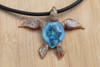Caribbean sea turtle with dancing coral reef in the glass shell