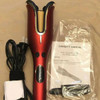 AUTOMATIC CURLING IRON