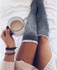Lace over knee piles of stockings