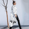 Toriko "Newspaper" print shirt dress