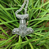 Thor's Hammer Pendant featuring Odin's Ravens. Thor's Hammer Pendant featuring Odin's Ravens.
