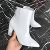 white high-heeled Chelsea boots