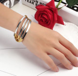 Multi-Layer Shimmering Leather Charm Bracelet