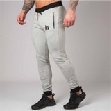 2017 Autumn Winter New Men Casual Joggers Compression Tight Zipper Packet Gyms Bodybuilding Pants Elastic Workout Sweatpants