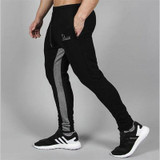 NUTAKA Gyms Mens Joggers Skinny Sweat Pants Embroidery Logo Tights Sweatpants For Men 2017 Gyms joggers workout Trousers