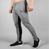 NUTAKA Gyms Mens Joggers Skinny Sweat Pants Embroidery Logo Tights Sweatpants For Men 2017 Gyms joggers workout Trousers