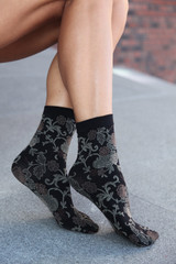 Socks with beige flowers