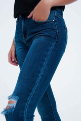 Distressed Skinny Fit Jeans in Mid Wash