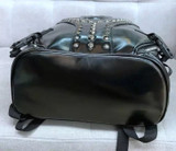 Skull head rivet leather backpack