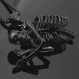 Skeletal torso pendant necklace
