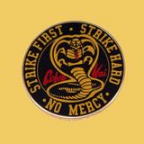 Strike First Strike Hard Enamel Pin