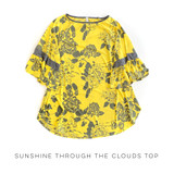 Sunshine Through the Clouds Top