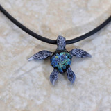 Mystic glass white sea turtle with stunning blues and greens of the ocean.
