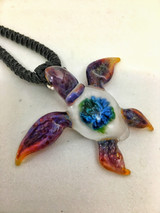 Light to dark purple glass turtle with the great barrier reef cluster shell.