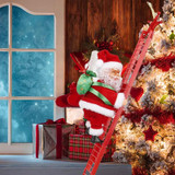 Santa Claus Climbing The Christmas Tree