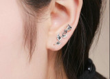 Sterling Silver Rose shaped stud earrings.