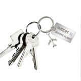 Insert Before Flight Tagged Airplane Key Chain