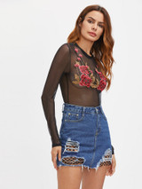 Distressed fishnet distressed cutout mini denim skirt