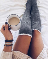 Lace over knee piles of stockings