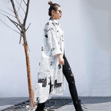 Toriko "Newspaper" print shirt dress