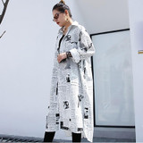 Toriko "Newspaper" print shirt dress