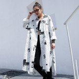 Toriko "Newspaper" print shirt dress