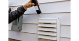 homeguide-dryer-vent-installation-on-a-house-exterior