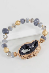 GLASS BEAD STRETCH BRACELET WITH PLATED NATURAL STONE ACCENT