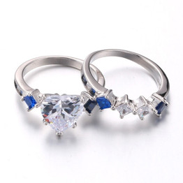 White/Blue Cubic Zirconia Heart and Blue Inlay Stainless Steel Wedding Bands Set