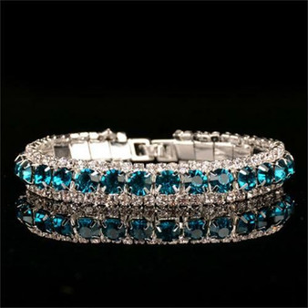 Blue Gems Lined With Diamonds Incased n 925 Sterling Silver Bracelet: Hutzell