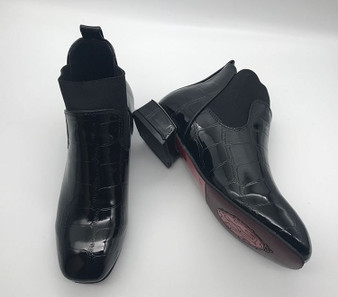 Black patent leather flat ankle boots