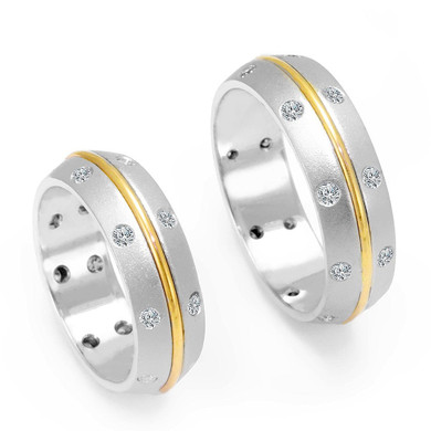 Ladies 14K Two Tone Rounded Wedding Band with Bezel Set Round Diamonds