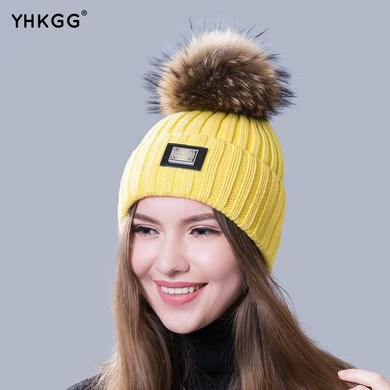 2016 new knitted hat fashion Women big Real Raccoon Fur pom pom Caps Crochet Hats For Women Winter Cute Casual Cap Women Beanies