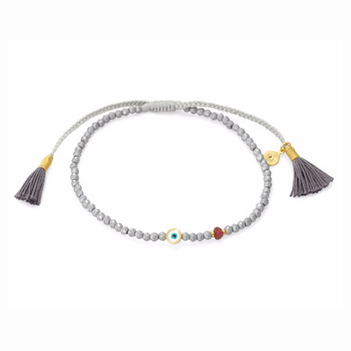 BEADED BRACELET WITH ROUND ENAMEL EVIL EYE CHARM