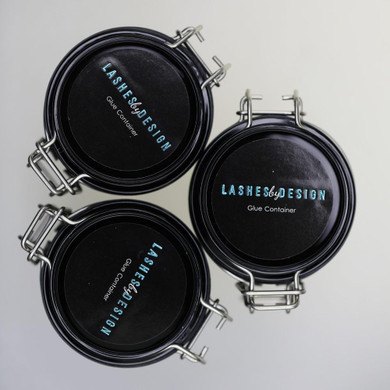 Adhesive Storage Container