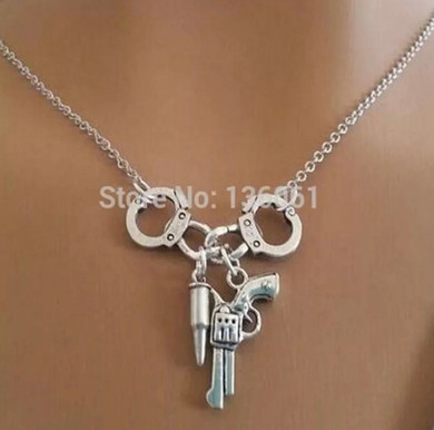 Guns and handcuff necklace